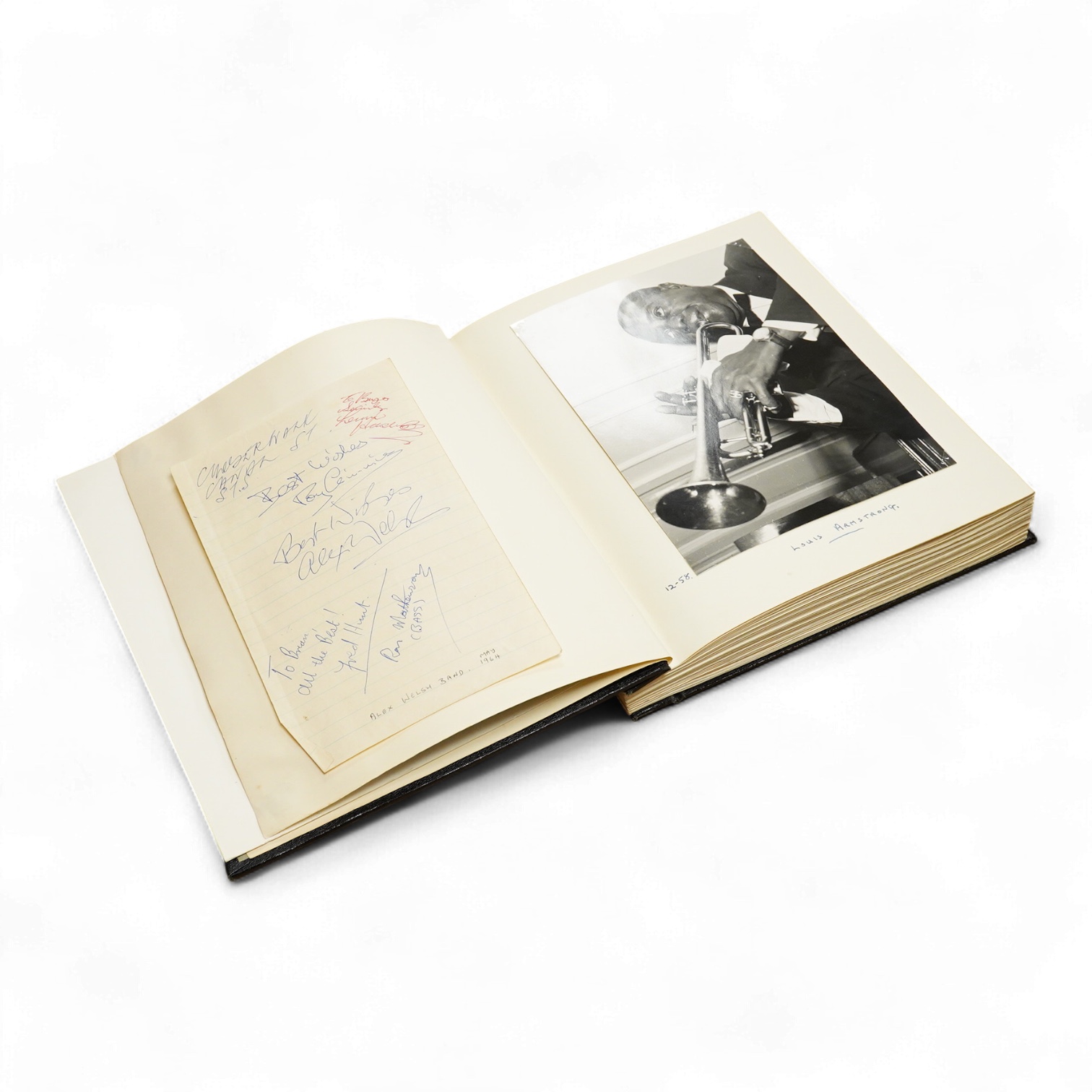 An album containing a wide selection of autographed publicity photographs of jazz and blues artists, including; Louis Armstrong, Chet Baker, Louis Bellson, Dave Brubeck, June Christy, Nat King Cole, Paul Desmond, Duke El